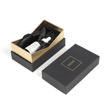 Bottiglia di olio essenziale cosmetica della scatola di PaperLuxury del profumo nero del cartone